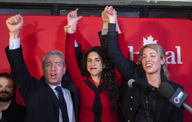 Liberal candidate Rachel Bendayan celebrates her victory in a byelection in the Montreal riding of Outremont with Infrastructure Minister Francois-Philippe Champagne and Tourism Minister Melanie Joly on Feb. 25, 2019.