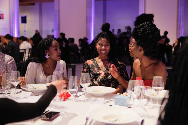 Members of the Black Wimmin Artists advisory committee talk at The Feast. Left to right: Ojo Agi, Raven Lam and Kosi Nnebe.