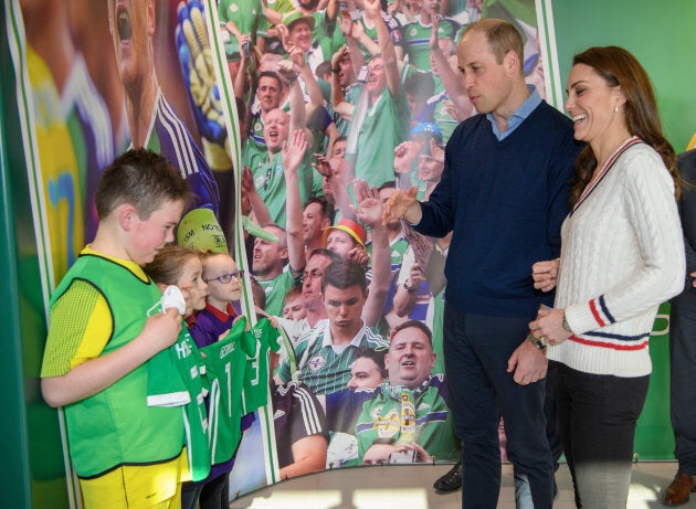 Kate and William look like they're enjoying the gifts, no?