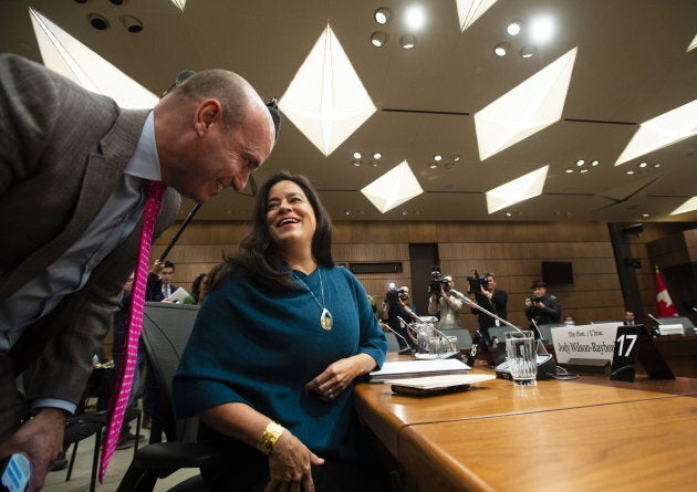 NDP MP Nathan Cullen speaks to Jody Wilson-Raybould as she arrives to appear at the House of Commons Justice Committee on Parliament Hill in Ottawa on Feb. 27, 2019.