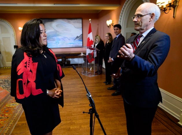 Prime Minister Justin Trudeau looks on as Jody Wilson-Raybould becomes veterans affairs minister at Rideau Hall in Ottawa on Jan. 14, 2019.