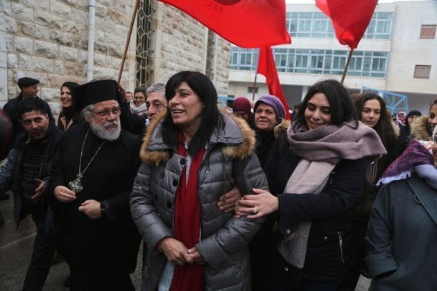 Khalida Jarrar (centre) is welcomed by her supporters and relatives after she was released from detention that lasted 20 months, in front of her house in Nablus, West Bank on Feb. 28, 2019.