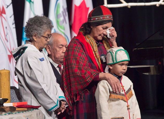 Elders offer prayers before Prime Minister Justin Trudeau delivered an apology on behalf of the Government of Canada to former students of the Newfoundland and Labrador Residential Schools in Happy Valley-Goose Bay, N.L. on Nov. 24, 2017.