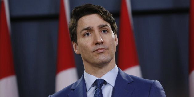 Prime Minister Justin Trudeau listens during a news conference at the National Press Theatre in Ottawa on March 7, 2019.