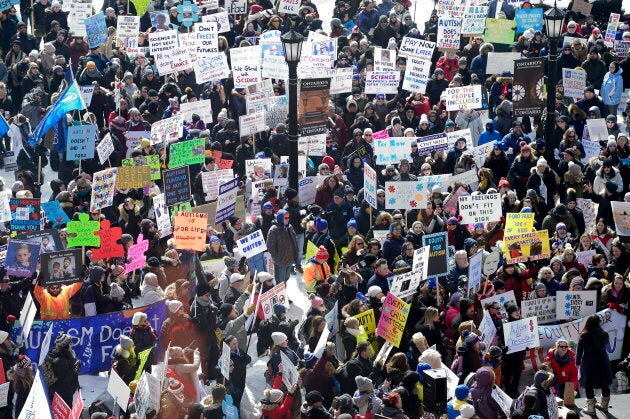 Hundreds of parents, therapists and union members gather outside Queen's Park in Toronto on March 7, 2019, to protest the provincial government's changes to Ontario's autism funding.