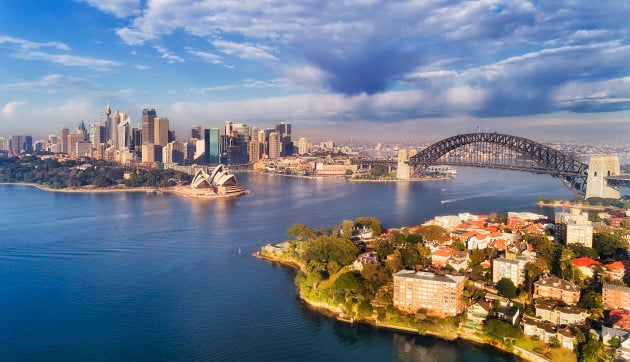 Apartment buildings overlooking the harbour waters in Sydney, N.S.W., Australia, with the skyline in the background. Sydney house prices are falling at their fastest pace in decades.