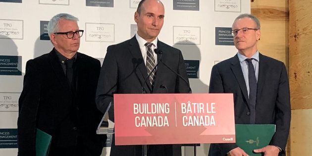Minister Jean-Yves Duclos (centre), responsible for Canada Mortgage and Housing Corporation, announces the federal government has provided an $89 million loan for an affordable rental building in Toronto on March 14, 2019. Toronto MPs Adam Vaughan (left) and Borys Wrzesnewskyj joined him.