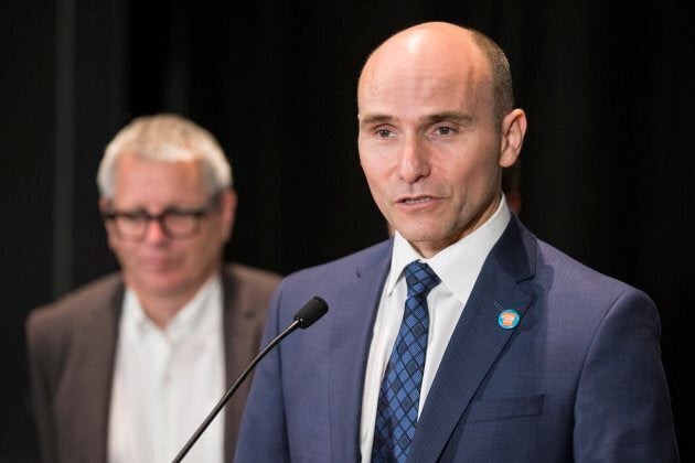 Jean-Yves Duclos, minister of families, speaks to the media at a the Toronto Housing Summit on Sept. 30, 2016.