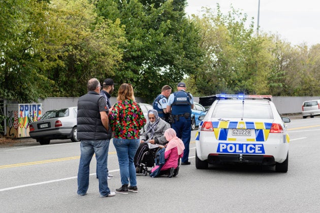 Members of the public react in front of the Masjd Al Noor Mosque as they fear for their relatives on March 15, 2019 in Christchurch, New Zealand.