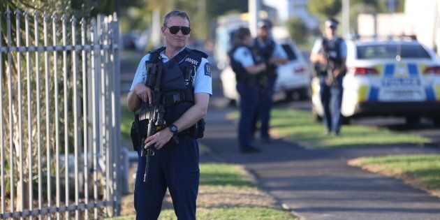 Armed police guard the Masijd Ayesha Mosque Auckland, New Zealand on March 15, 2019 following two shootings at mosques in Christchurch.