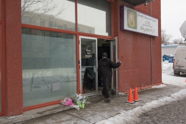 A man walks into the mosque at the Islamic Cultural Center that was the location of a terror attack in Quebec City, Quebec.