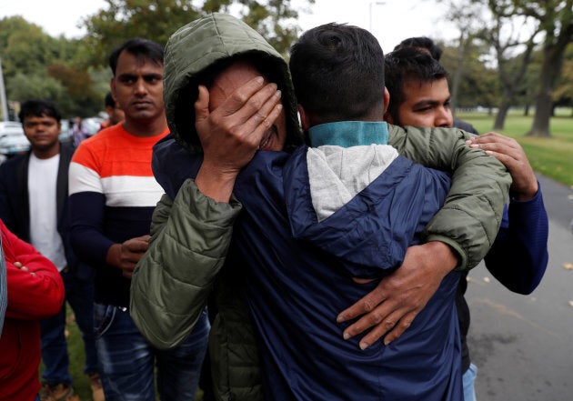 Relatives of a member of the Bangladeshi community wait for news at a community centre in Christchurch, New Zealand on March 17, 2019.