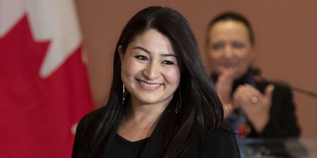 Minister for Women and Gender Equality and Minister of International Development Maryam Monsef returns to her seat after being sworn in during a cabinet shuffle at Rideau Hall in Ottawa on Mar. 1, 2019.