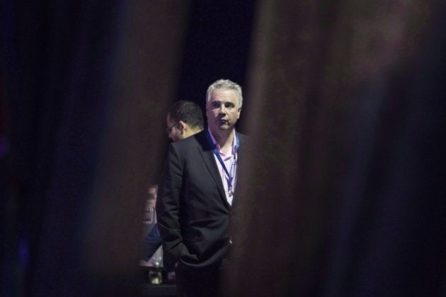 Ontario Premier Doug Ford's chief of staff Dean French stands behind a curtain at the Ontario PC party's convention in Toronto, on Nov. 16, 2018.