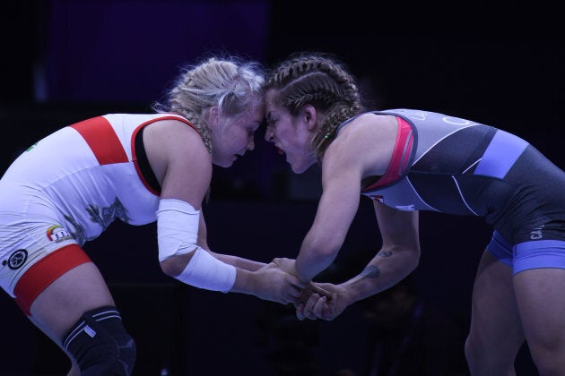 From left to right, Petra OLLI of Finland wrestles against Danielle Lappage of Canada at the World Wrestling Championships in Papp Laszlo Arena in Budapest last year.