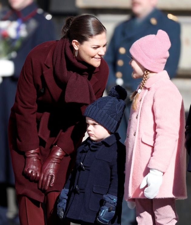 Princess Estelle of Sweden, probably telling her mother that she would happily accept some candy, as wee Prince Oscar endures horrifying potty training flashbacks.