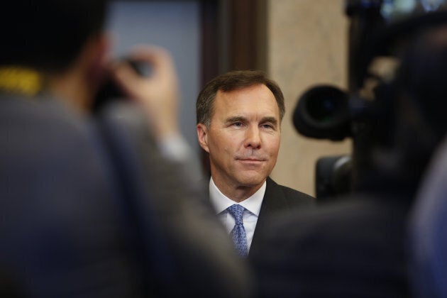 Finance Minister Bill Morneau speaks to members of the media after tabling the federal budget in Ottawa on March 19, 2019.