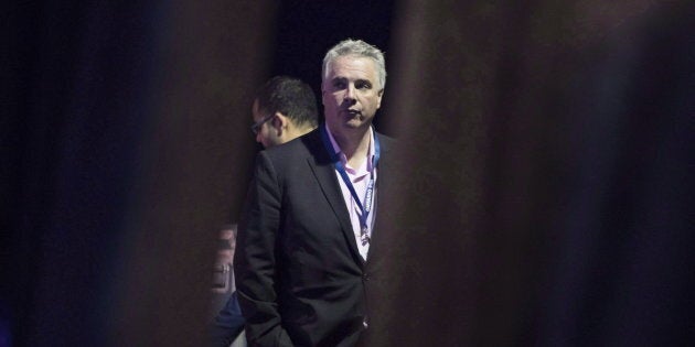 Ontario Premier Doug Ford's chief of staff Dean French stands behind a curtain at the Ontario Progressive Conservative party convention in Toronto on Nov. 16, 2018.