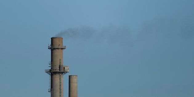 Emissions are seen coming from an Ontario cement plant in this 2015 file photo. Experts say the provincial government's plan to repeal a toxic substance regulation with affect human health and the environment.