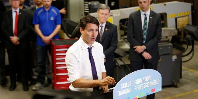 Prime Minister Justin Trudeau talks to media after meeting with students and teachers at Manitoba Institute of Trades and Technology (MITT) in Winnipeg on March 26, 2019.