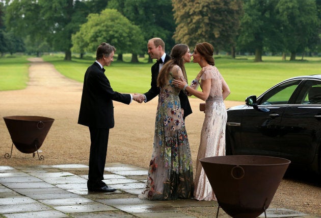 Prince William and Catherine, Duchess of Cambridge are greeted by David Cholmondeley, Marquess of Cholmondeley and Rose Cholmondeley, the Marchioness of Cholmondeley as they attend a gala dinner in support of East Anglia's Children's Hospices' in King's Lynn, England in 2016.