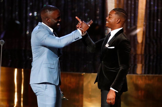 Shamier Anderson presents the Radius Award to his brother, Stephan James.