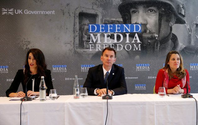 Britain's Foreign Secretary Jeremy Hunt, Canada's Foreign Minister Chrystia Freeland and human rights lawyer Amal Clooney attend a news conference on media freedom as part of the G7 Foreign Ministers' meeting in Dinard, France, April 5, 2019. REUTERS/Stephane Mahe