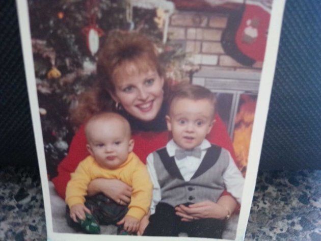 Jeremy Roberts is seen in a family photo with his younger brother Dillon and his mother Janine.