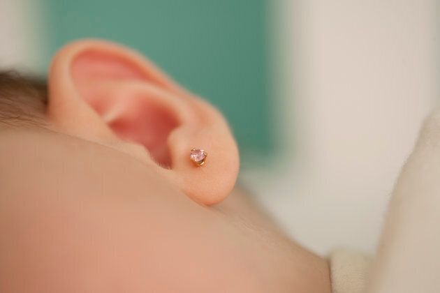 Some children choose to pierce their ears, but some have their parents' wills forced on them.