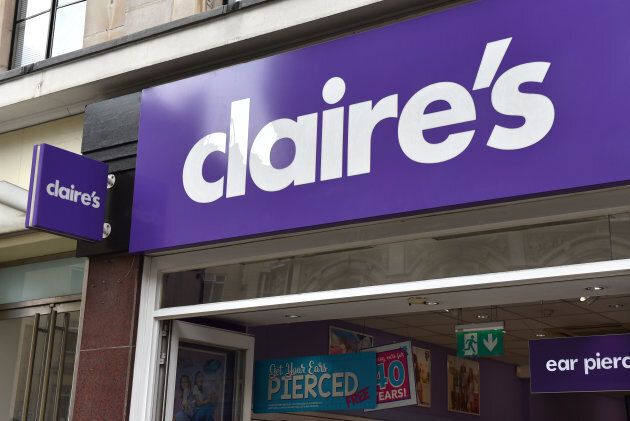 Claire's has said it will review its ear-piercing policies.