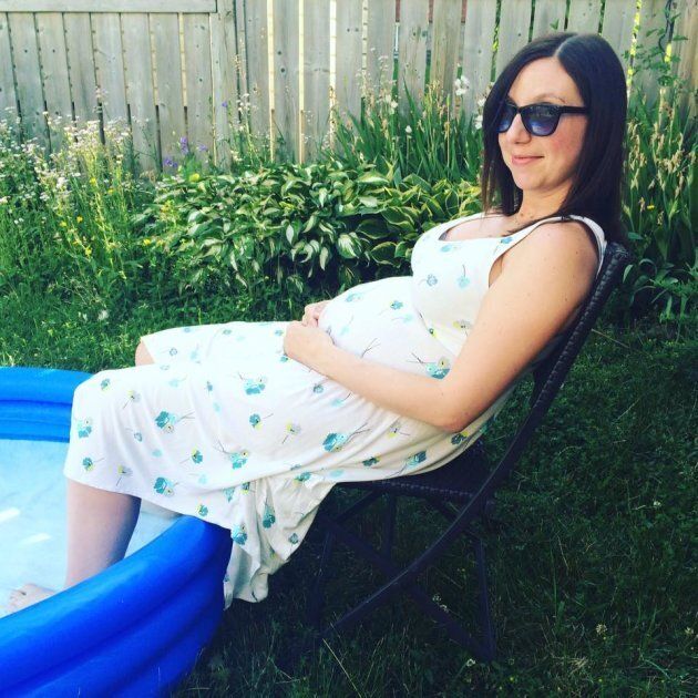 Natalie Stechyson cools her swollen feet while pregnant with her son.