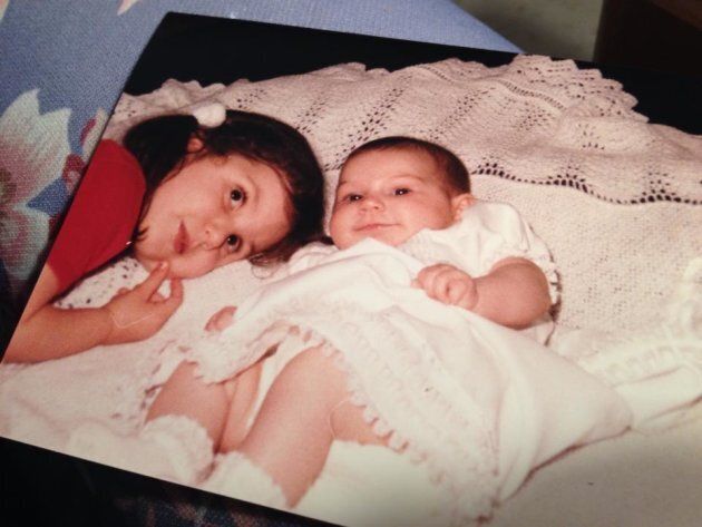 Natalie Stechyson and her younger sister, probably plotting the best way to sync up episodes of "The Bachelor" so they can watch them at the same time 33 years later.