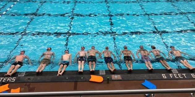 Aquatica Synchro Men's Team, which is made up of dads and husbands of female athletes, during a practice in Winnipeg.