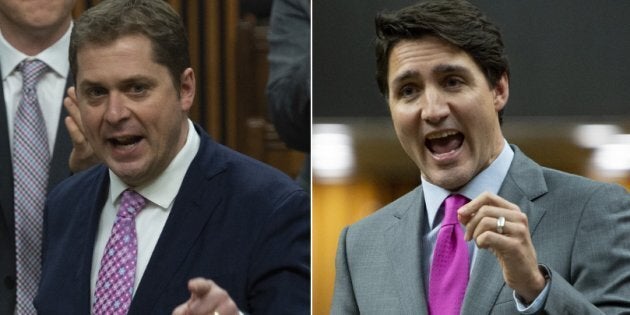 Conservative Leader Andrew Scheer and Prime Minister Justin Trudeau speak during question period in the House of Common on April 10, 2019.