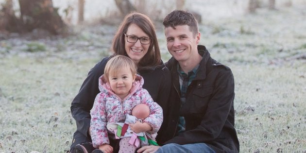 Patricia and Aaron Pearson are pictured with their two-year-old biological daughter Emma, shown in December 2018. The couple was in the process of adopting a child when the the Victoria, B.C. agency they were using announced its closure.