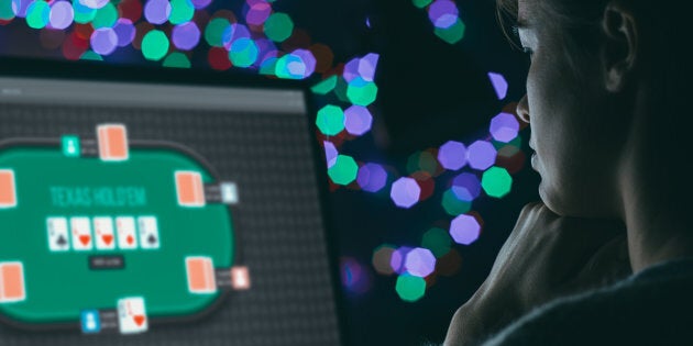 A woman plays an online gambling game in a stock photo. The Ontario government announced it plans to legalize online gambling in its 2019 budget.