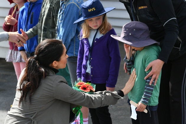 The Duchess of Sussex speaks to an emotional Joe Young, 5, in Wellington, New Zealand.