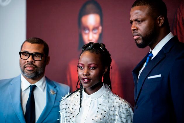 Director/writer Jordan Peele (left) stands next to actress Lupita Nyong'o and actor Winston Duke at the New York premiere of "US" on Mar. 19, 2019 in New York City.