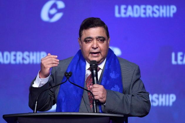 Deepak Obhrai speaks to the crowd during the opening night of the federal Conservative leadership convention in Toronto on May 26, 2017.