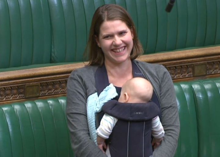 Swinson with her baby son in the Commons