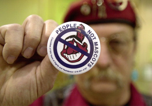 Powwow Participant Displays Anti-Mascot Pin