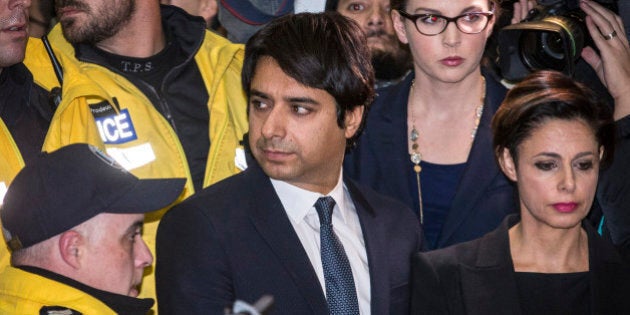 TORONTO, ON - NOVEMBER 26: Jian Ghomeshi leaving College Park Court with his Lawyer Marie Henein after...