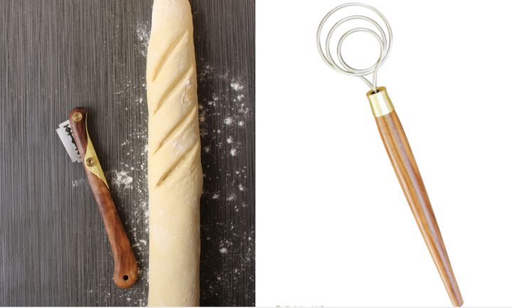 Left to right: A black walnut bread lame (used to slash patterns into dough) and a dough whisk.