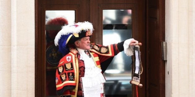 QUALITY REPEATTown crier Tony Appleton makes an announment of the birth of Catherine, Duchess of Cambridge and Prince William's second child, a daughter, outside the Lindo wing at St Mary's hospital in central London, on May 2, 2015. The Duchess of Cambridge was safely delivered of a daughter weighing 8lbs 3oz, Kensington Palace announced. AFP PHOTO / LEON NEAL (Photo credit should read LEON NEAL/AFP/Getty Images)