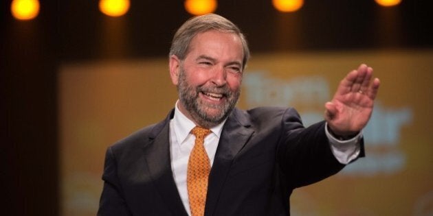 Canadian New Democratic Party (NDP) leader Tom Mulcair acknowledges applause at a rally in Montreal on October 18, 2015. Canadians go to the polls on October 19 with the option of choosing to 'stay the course' with the Conservatives or plump for change touted by the Liberals and New Democrats, in legislative elections too close to call. AFP PHOTO/NICHOLAS KAMM (Photo credit should read NICHOLAS KAMM/AFP/Getty Images)