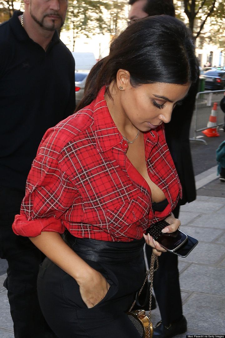 Kim Kardashian Flashes Her Bra During Paris Fashion W