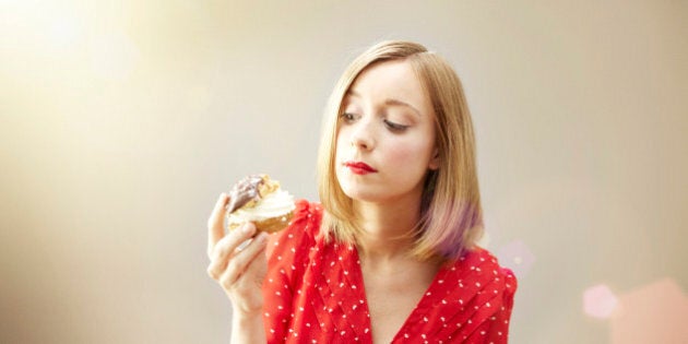 girl eating cream cake