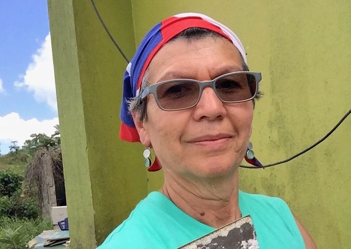 Edna Benitez, rebuilding a home in Miraflores.