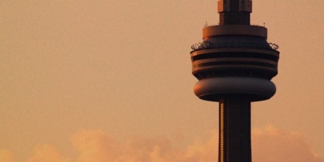 Toronto's CN Tower as seen from Centre Island during sunset.