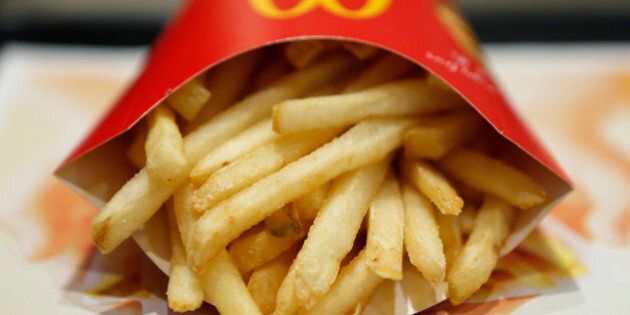 A packet of french fries sit on a tray in this arranged photograph at a McDonald's restaurant, operated by McDonald's Holdings Co. Japan Ltd., in Tokyo, Japan, on Wednesday, Jan.7, 2015. McDonald's Corp.'s Japan business and Cargill Inc. are investigating complaints objects were found in chicken nuggets made by a Cargill factory in Thailand, the restaurant chainÃ¢s second food safety crisis in six months. Photographer: Kiyoshi Ota/Bloomberg via Getty Images